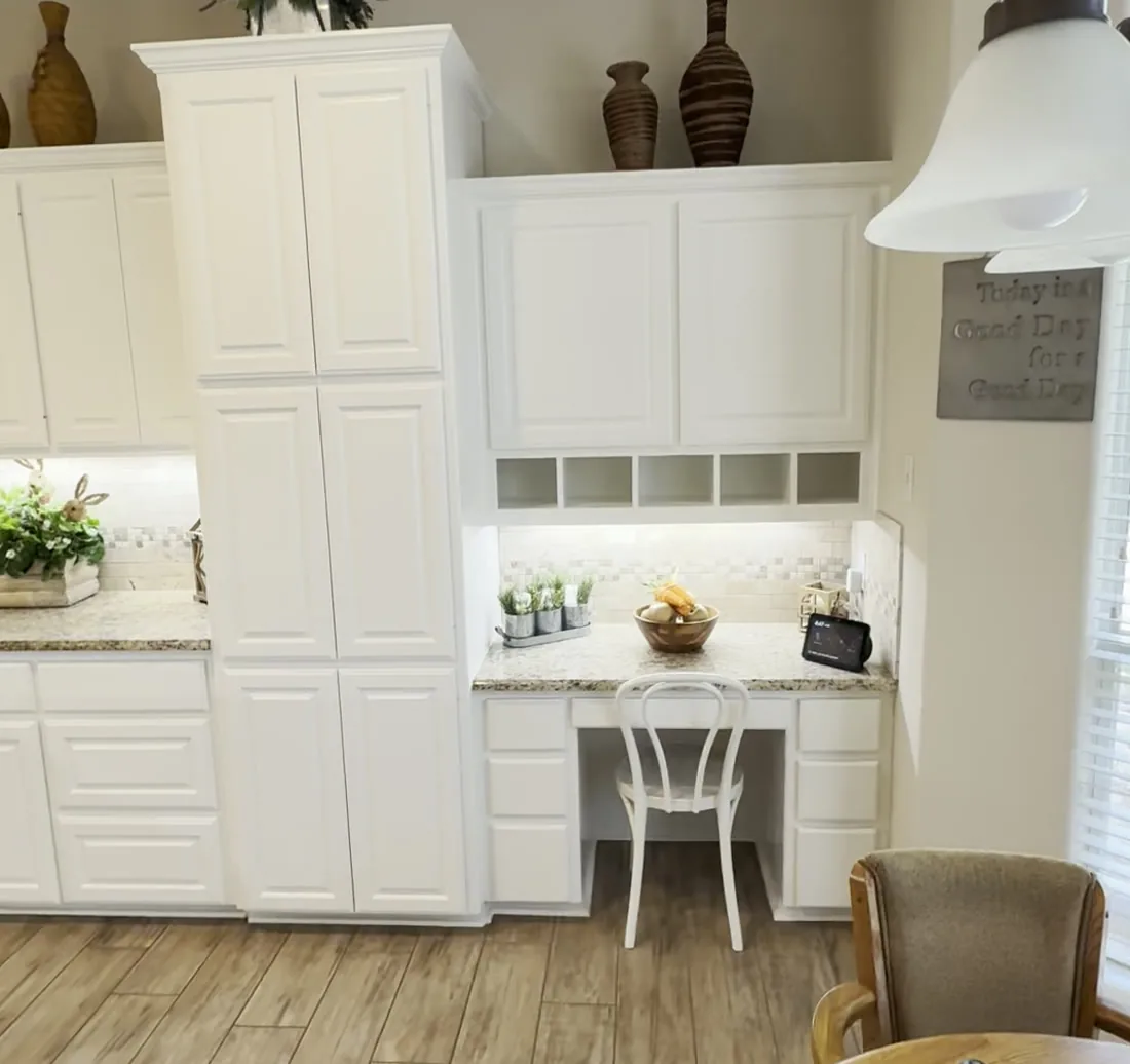The same kitchen on March 17, 2025, with the cabinets painted white